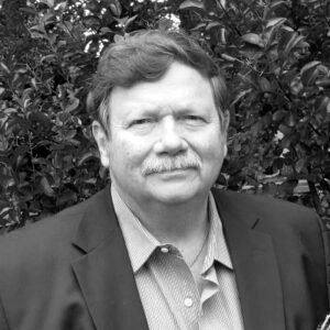 Bob Carrell headshot in black and white.